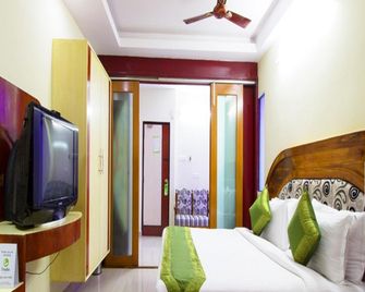 Treebo Trip Sun Square - Vijayawada - Bedroom