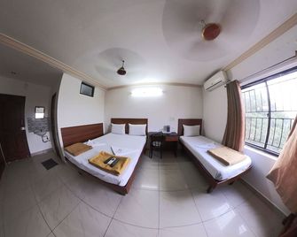 Hotel Adithya - Madrás - Habitación