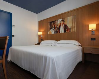 Residenze Romeo E Giulietta - Parma - Schlafzimmer