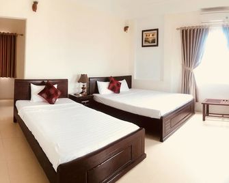 Nam Long Plus Hotel - Dong Hoi - Bedroom