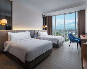 Aston Purwokerto Hotel & Conference Center - Purwokerto - Schlafzimmer