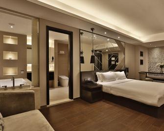 Crystal Orange Hotel Wuxi Nanchang Street - Wuxi - Bedroom