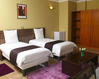 Melodie Hotel - Addis Ababa - Bedroom