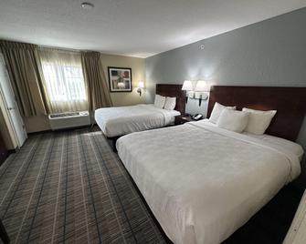 MainStay Suites - Coralville - Bedroom