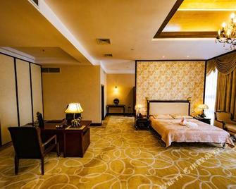 Bei Hu Hotel - Xinyu - Bedroom