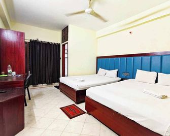 Urmee Guest House - Cox's Bazar - Спальня