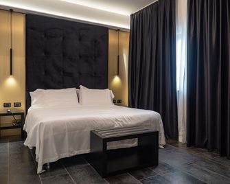 My Suite Hotel - L'Aquila - Schlafzimmer