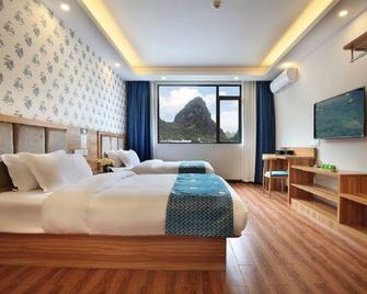 Qingyunge Hotel - Guilin - Slaapkamer