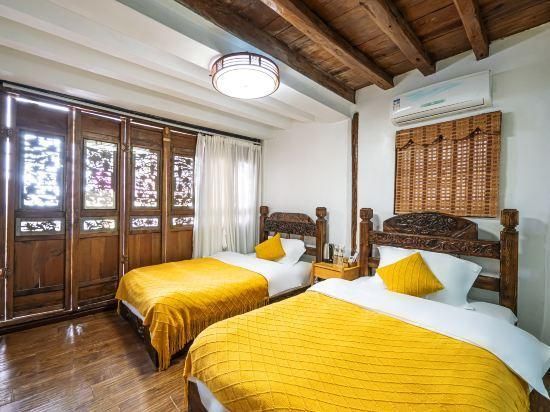 Yuhuai Renjia Inn - ליז'יאנג - חדר שינה