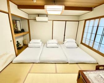 Deluxe Family Room 7 people in the same room / Tokushima Tokushima - Tokushima - Bedroom