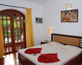 Sea Breeze Beach Resort Candolim - Candolim - Makuuhuone