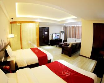Thank Inn Chain Hotel Gansu Wuwei Fenghuang Road - 우웨이 - 침실