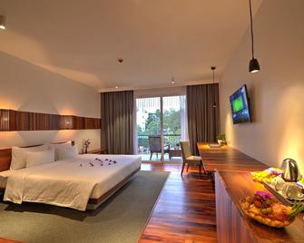 Hotel Somadevi Angkor Boutique and Resort - סיאם ריפ - חדר שינה