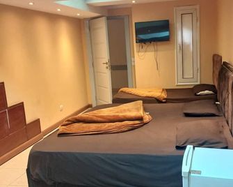 Blue Eyes Hotel - קהיר - חדר שינה