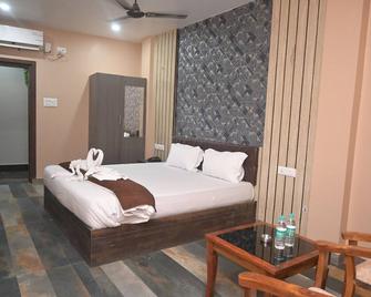 Hotel Maa International - Alīpur Duār - Bedroom