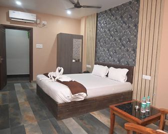 Hotel Maa International - Alīpur Duār - Habitación
