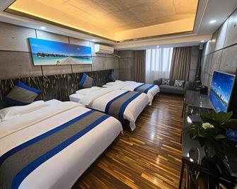 Zhangjiajie Mr.F Boutique Hotel (Tianmen Mountain Cableway Station) - Zhangjiajie - Bedroom