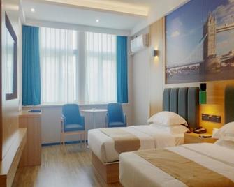 Greentree Inn Qinyang Middle Huaifu Road Express Hotel - Jiaozuo - Schlafzimmer