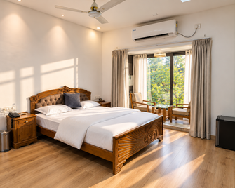 Toppers Corner - A Boutique Garden Resort - Mount Abu - Slaapkamer