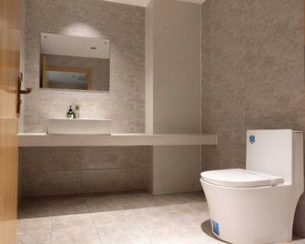 Dandong Shuiyifang Bathing and Accommodation - Dandong - Schlafzimmer