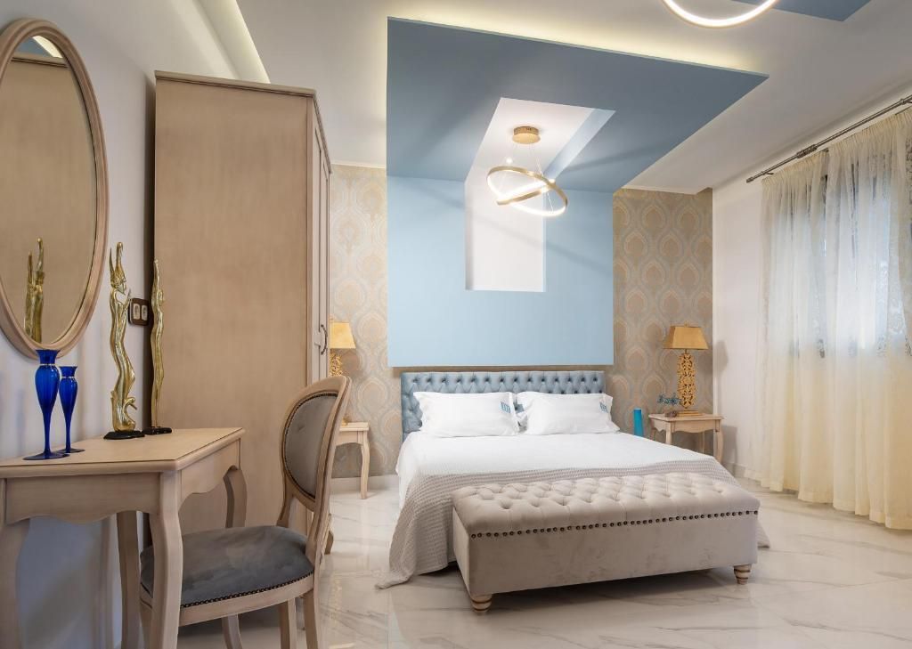 Pela Veranda Exquisite Suites - נאוס מרמראס - חדר שינה