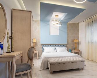 Pela Veranda Exquisite Suites - נאוס מרמראס - חדר שינה