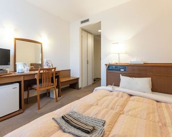 Tendo Central Hotel - טנדו - חדר שינה