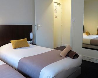 Hotel de la Paix - קאה - חדר שינה