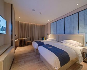 Echarm Hotel Guangzhou Kecun Metro Station Pazhou Exhibition - Guangzhou - Bedroom