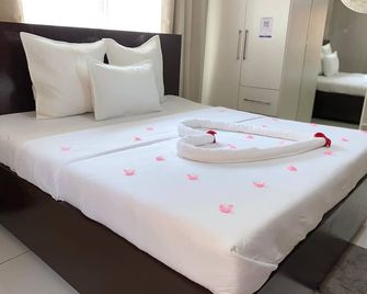 Stadium View Executive Guest House - לילונגווה - חדר שינה