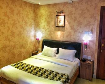 Hotel Sea Palace - Kollam - Slaapkamer