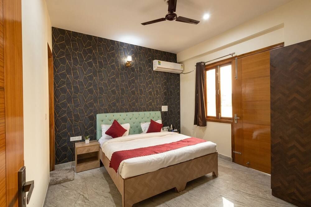 Divine Hotels & Banquets - Noida - Schlafzimmer