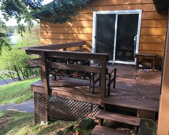 Lake House with large wooded lot! Wake up to the sights and sounds of the lake! - Superior - Patio