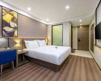 7 Premium Hotel (Zhuhai Gongbei Port Branch) - Zhuhai - Bedroom