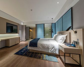 Echarm Hotel Wuhu Pedestrian Street High-speed Railway Station - Wuhu - Bedroom