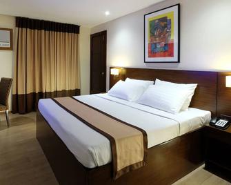 Golden Prince Hotel & Suites - Cebu City - Schlafzimmer