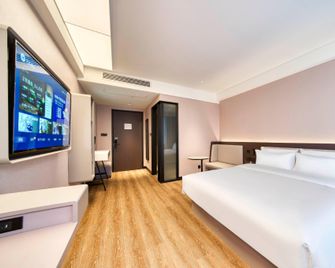 Hanting Hotel Ningbo High-Tech Zone Jiangnan Road - Ningbo - Slaapkamer