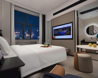 Huanzhi Hotel Hulunbuir Hailar Railway Station Branch - Hulunbuir - Спальня