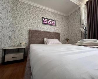 Massaget Hotel - Nukus - Camera da letto