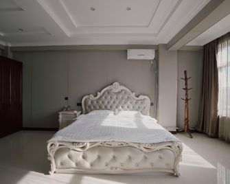 Liyuan Inn - Dandong - Schlafzimmer