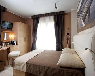 Hotel C'Era Una Volta - Castiglione della Pescaia - Schlafzimmer