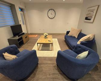 Centrally located 2 bedroom suite! - Burnaby - Living room