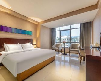 Ming Tien Inn - Wuzhou - Bedroom