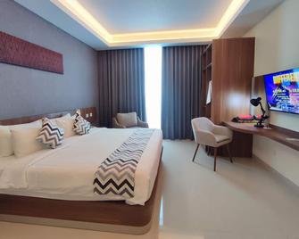 Unhas Hotel & Convention - Makassar - Slaapkamer