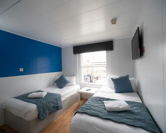 CiTi Hotel London Luton by Belvilla - Luton - Bedroom