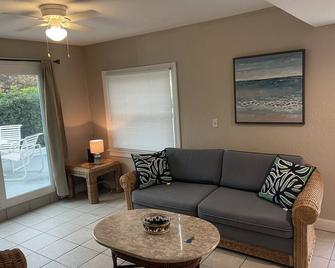 Ocean Front with Patio and Private Beach Access - Melbourne Beach - Living room
