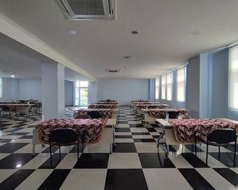 Hotel Sutha Inn Syariah - Jambi - Restaurant