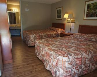 Executive Inn & Suites - Orange - Slaapkamer