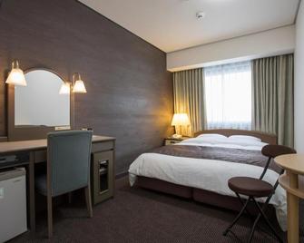 Sunroute Aomori Hotel - אומורי - חדר שינה