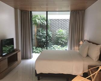 Nagomi Suites & Hotel - Jakarta - Kamar Tidur